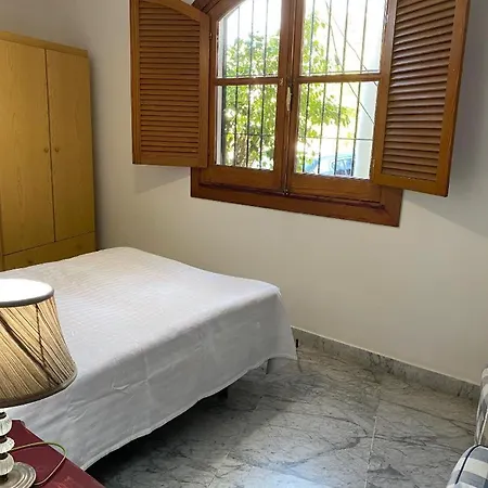 Casa-a-pequeno Conjunto Casas Adosados *